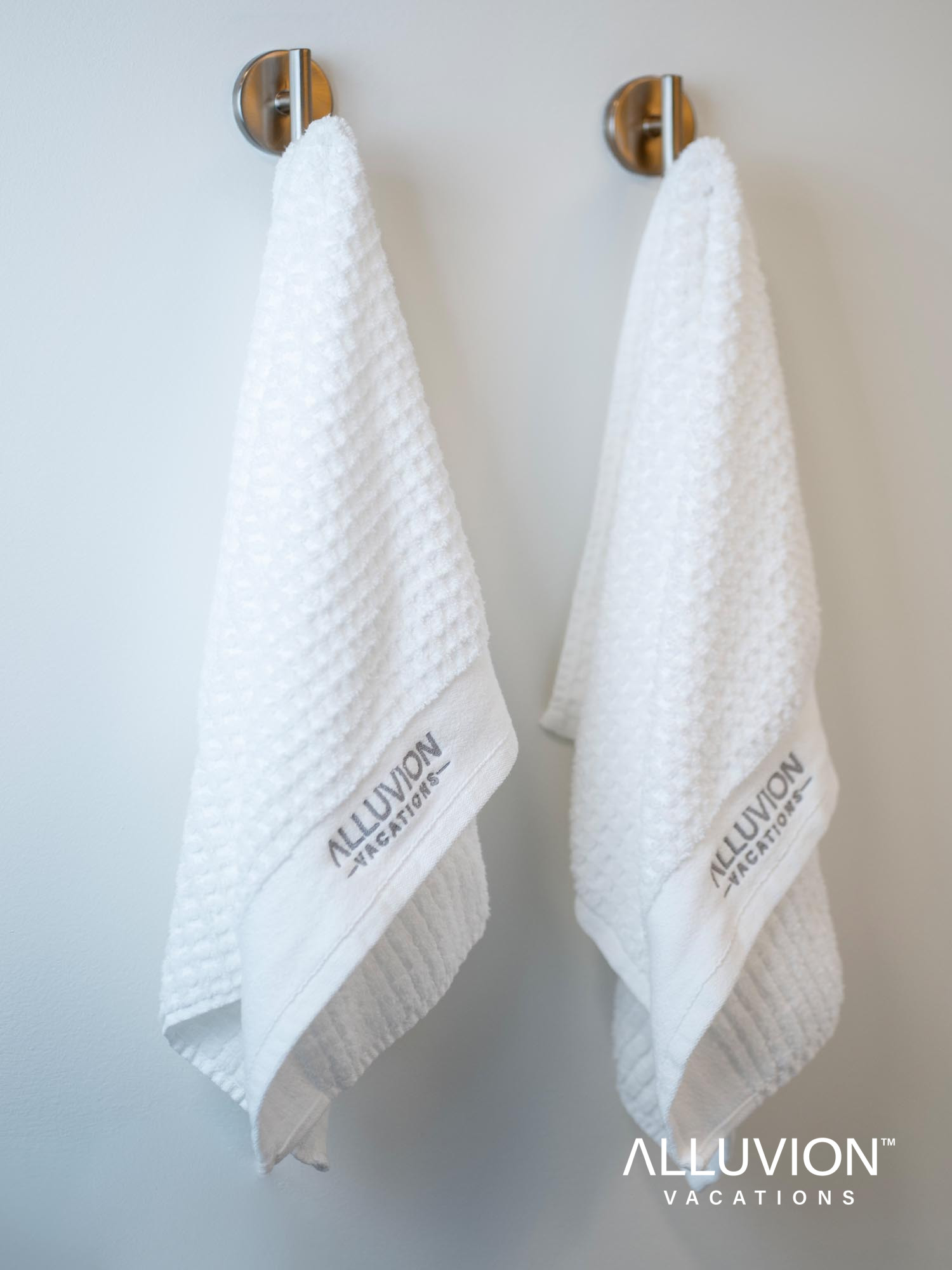 Discover the Ultimate Comfort of Experiential Hospitality with Alluvion Vacations' Signature Linen Service and Soft Waffle Towels!